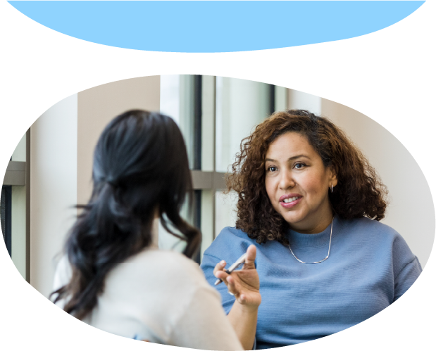 An adult talking to another adult