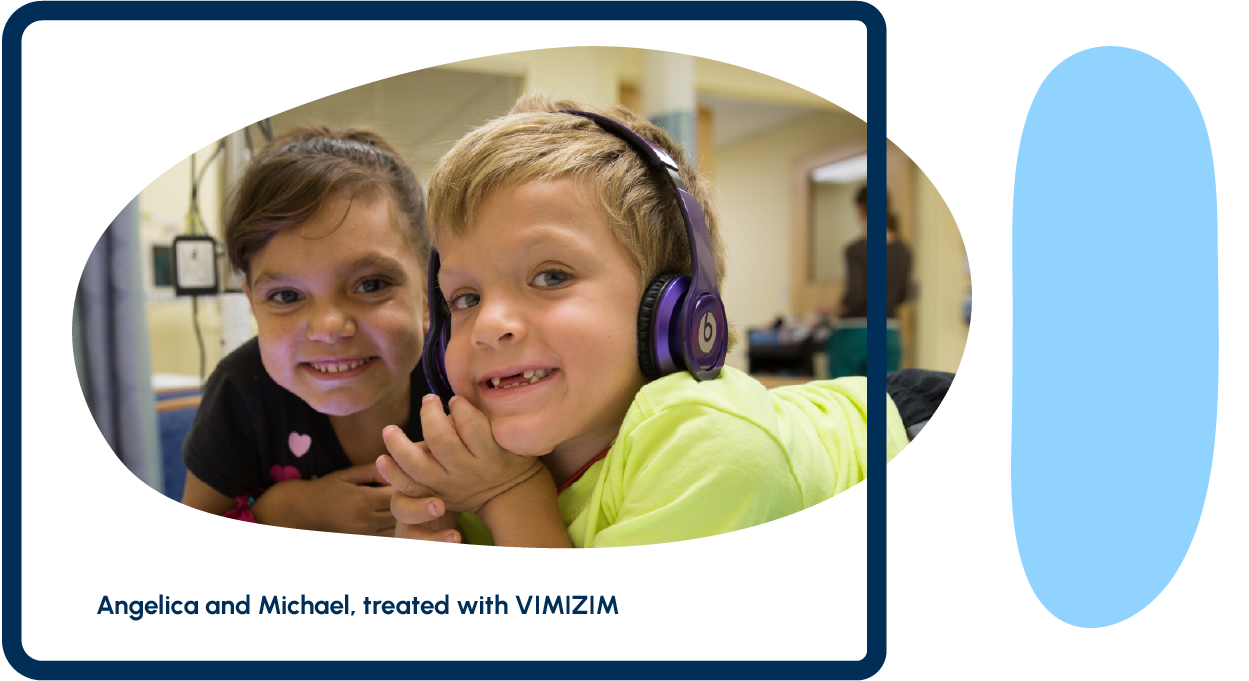 Two children, one with a headset, smiling